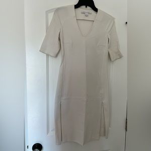 Diane Yon Furstenberg white dress with zipper front and back. In perfect cond.